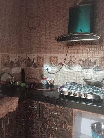 Kitchen in 1 RK Apartment at Arun Vihar Sector 37, Sector 37 – for Rent