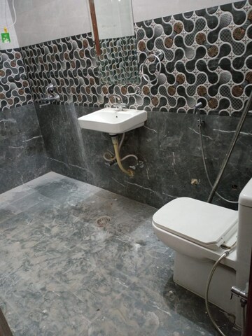 Bathroom in 3 BHK Apartment at RWA Apartments Sector 122, Sector 122 – for Rent