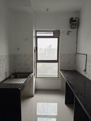Kitchen in 1 BHK Apartment at Kalpataru Immensa, Kolshet Road – for Sale