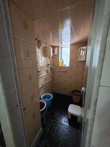 Bathroom in 2 BHK Apartment at Bombay Taximens CHS, Lbs Marg – for Rent