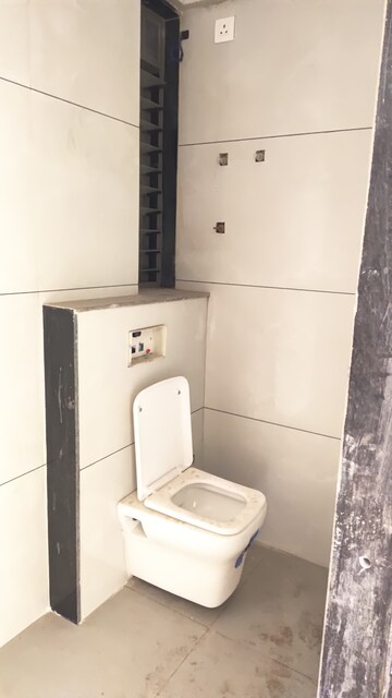 Bathroom in 2 BHK Apartment at Gangapur Road – for Sale