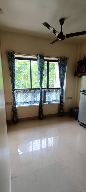 Bedroom in 1 BHK Apartment at Lokhandwala Infrastructure Spring Leaf, Kandivali East – for Sale