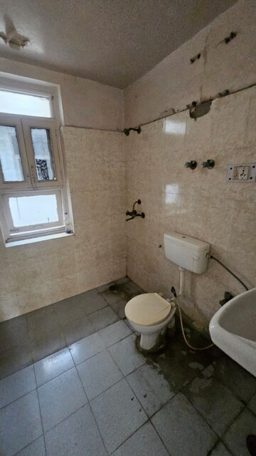 Bathroom in 4 BHK Apartment at Amrapali Crystal Homes, Sector 76 – for Sale