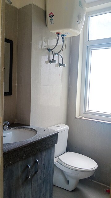 Bathroom in 3 BHK Apartment at Emaar Palm Hills, Sector 77 – for Rent