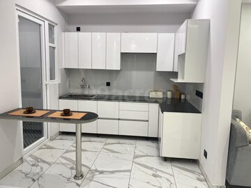 Kitchen in 3 BHK Apartment at Raj Nagar Extension – for Sale