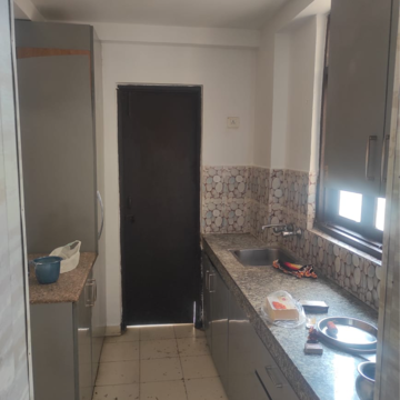 Kitchen in 2 BHK Apartment at Apex Our Homes, Garoli Kalan – for Rent
