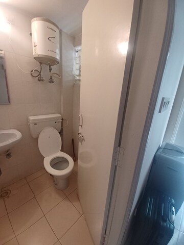 Bathroom in 2 BHK Apartment at Shriram White House, Rt Nagar – for Rent