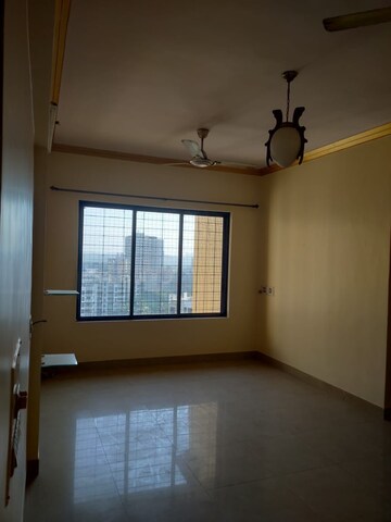 Room in 2 BHK Apartment at Riddhi Garden, Malad East – for Rent