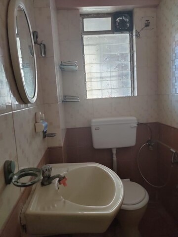 Bathroom in 2 BHK Apartment at Riddhi Garden, Malad East – for Rent