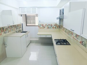 Kitchen in 4 BHK Apartment at Rustomjee 9 JVPD, Juhu – for Sale