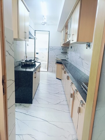 Kitchen in 4 BHK Apartment at Rustomjee 9 JVPD, Juhu – for Sale