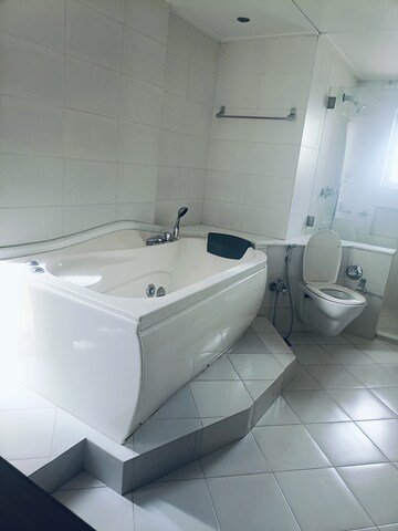 Bathroom in 4 BHK Apartment at Rustomjee 9 JVPD, Juhu – for Sale