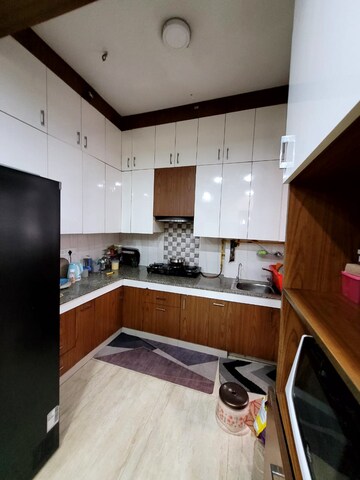 Kitchen in 3 BHK Apartment at Shri Radha Aqua Garden, Sector 16b Greater Noida – for Sale
