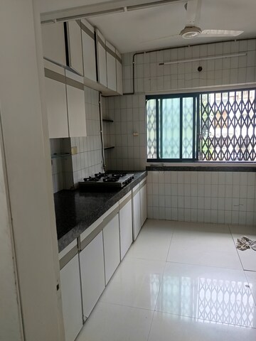 Kitchen in 2.5 BHK Apartment at Vile Parle East – for Rent