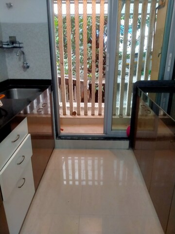 Kitchen in 2 BHK Apartment at Jeevan Sarita CHS, Vile Parle East – for Rent