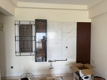 Living Room in 2 BHK Apartment at Ahad Serenity, Rayasandra – for Rent