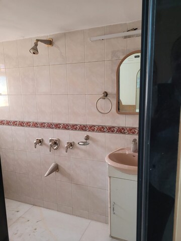 Bathroom in 2 BHK Apartment at Koteshwar Palace, Andheri East – for Rent