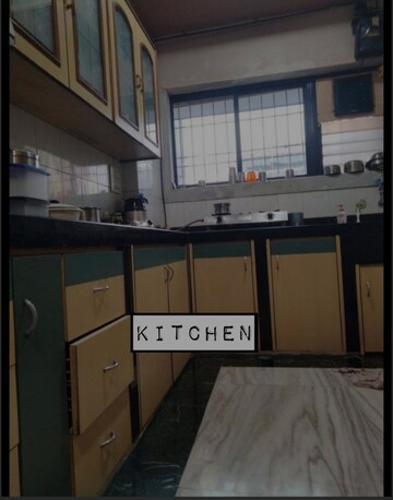 Kitchen in 3 BHK Apartment at Rajgir Court Apartment, Dadar East – for Sale