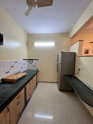Kitchen in 2 BHK Apartment at Naiknavare Trinity Court, Koregaon Park – for Rent