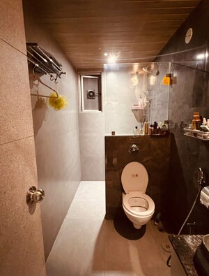 Bathroom in 3 BHK Apartment at Vesu – for Sale