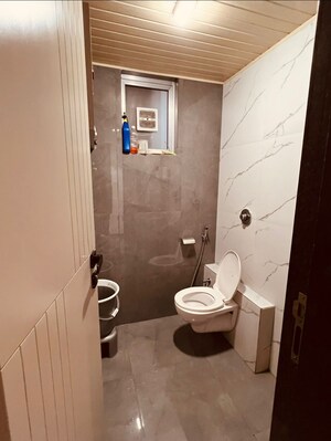 Bathroom in 3 BHK Apartment at Vesu – for Sale