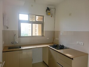 Kitchen in 1 BHK Apartment at Hiranandani Estate, Ghodbunder Road – for Sale
