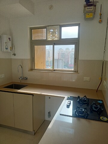 Kitchen in 1 BHK Apartment at Hiranandani Estate, Ghodbunder Road – for Rent