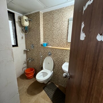 Bathroom in 1.5 BHK Apartment at Lodha Palava City Lakeshore Greens, Hedutane – for Rent
