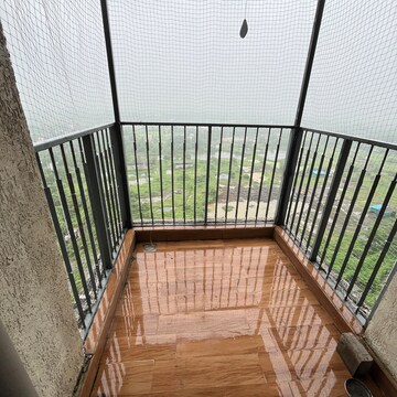 Balcony in 1.5 BHK Apartment at Lodha Palava City Lakeshore Greens, Hedutane – for Rent