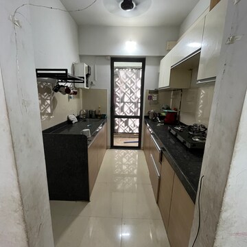 Kitchen in 1.5 BHK Apartment at Lodha Palava City Lakeshore Greens, Hedutane – for Rent