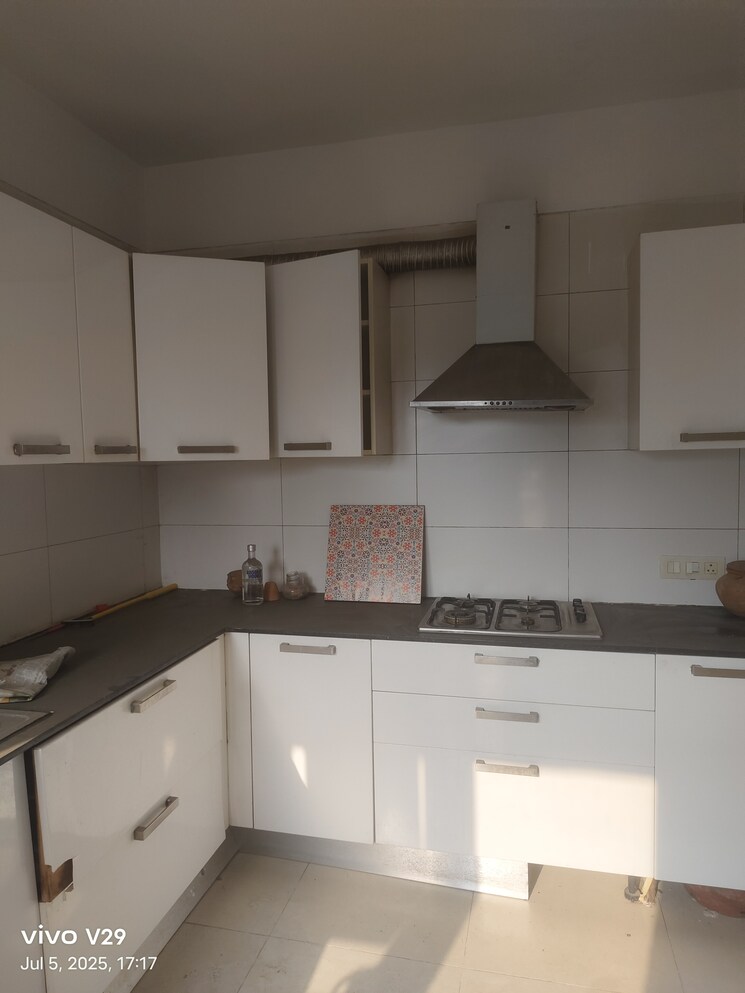 Kitchen, emaar-the-palm-drive-the-premier-terraces 4 Bedroom 4050 Sq.Ft. Penthouse In Sector 66 Gurgaon 8960372