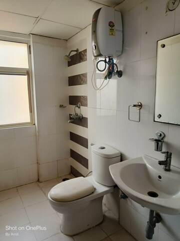 Bathroom in 4 BHK Apartment at Amrapali Eden Park, Sector 50 – for Sale