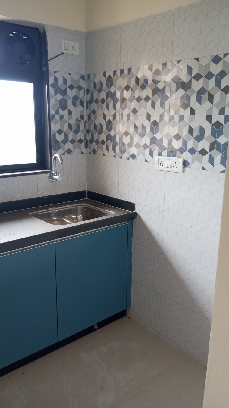 Kitchen, raunak-unnathi-woods-phase-7-a-and-b 1 Bedroom 416 Sq.Ft. Apartment In Ghodbunder Road Thane 8960492
