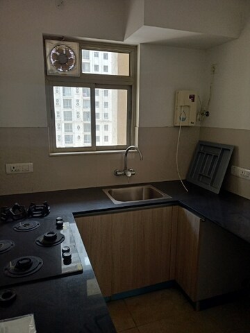 Kitchen in 1 BHK Apartment at Hiranandani Castalia, Ghodbunder Road – for Rent