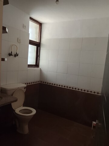 Bathroom in 4 BHK Apartment at Amrapali Royal, Vaibhav Khand – for Rent