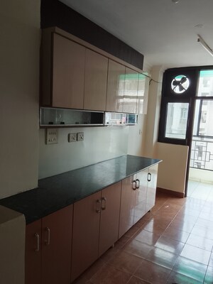 Kitchen in 4 BHK Apartment at Amrapali Royal, Vaibhav Khand – for Sale