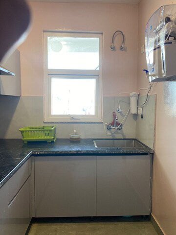 Kitchen in 1.5 BHK Builder Floor at Palm Residency Chhatarpur, Chattarpur – for Rent