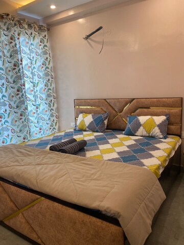 Bedroom in 1.5 BHK Builder Floor at Palm Residency Chhatarpur, Chattarpur – for Rent