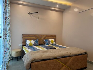 Bedroom in 1.5 BHK Builder Floor at Palm Residency Chhatarpur, Chattarpur – for Rent