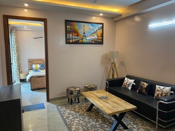 Living Room in 1.5 BHK Builder Floor at Palm Residency Chhatarpur, Chattarpur – for Rent
