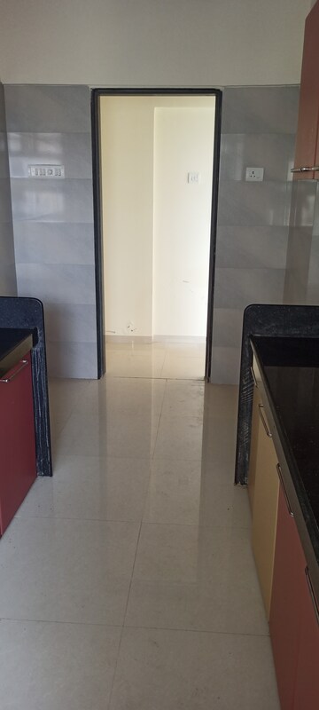Kitchen in 1 BHK Apartment at Rajendra Dolphin Tower, Malad West – for Rent