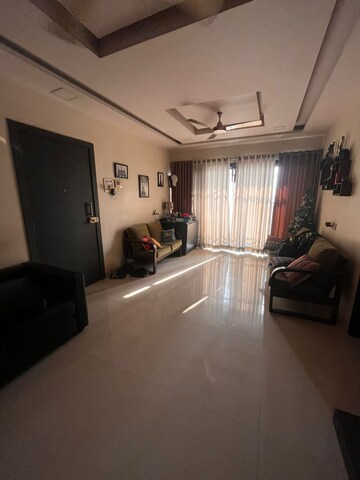 Living Room in 2.5 BHK Apartment at Uma Sparta, Ghodbunder Road – for Sale