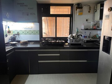 Kitchen in 2.5 BHK Apartment at Uma Sparta, Ghodbunder Road – for Sale