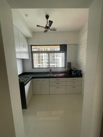 Kitchen in 2 BHK Apartment at Shapoorji Pallonji Alpine, Kandivali East – for Rent