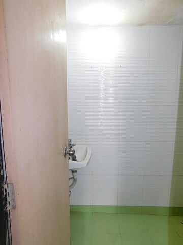 Bathroom in 1 BHK Apartment at Nehru Nagar – for Sale