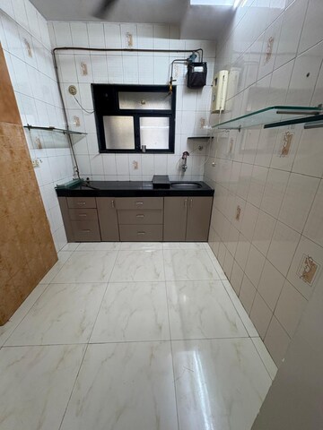 Kitchen in 1 BHK Apartment at Hanuman Chaya CHS, Tilak Nagar – for Rent