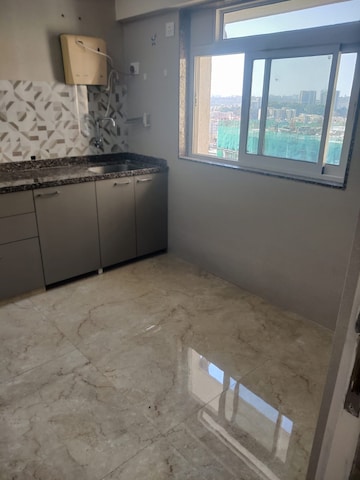 Kitchen in 1 BHK Apartment at Srishti Harmony 3 Phase 1, Andheri East – for Rent