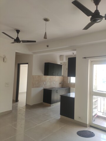 Team Area in 2 BHK Apartment at Aims Golf City, Sector 75 – for Rent