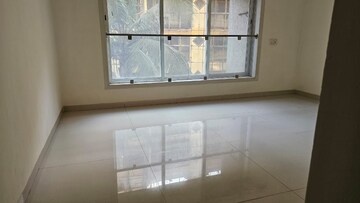 Living Room in 2 BHK Apartment at Romell Diva, Malad West – for Rent