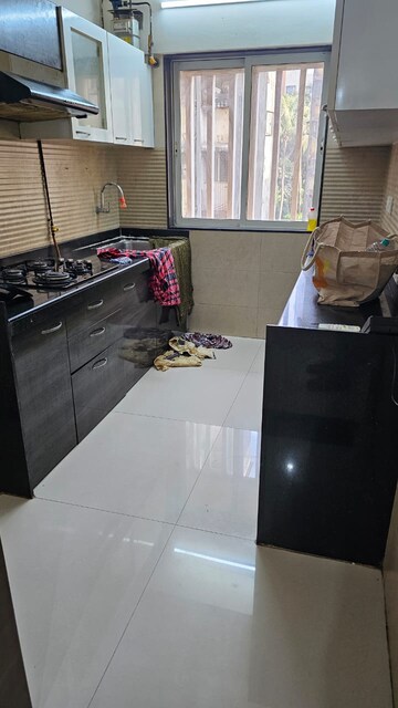 Kitchen in 2 BHK Apartment at Romell Diva, Malad West – for Rent